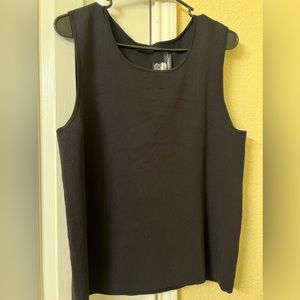 Black sleeveless top.